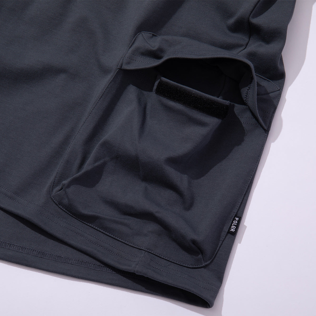 OUTSIDE POCKET FURRY TEE