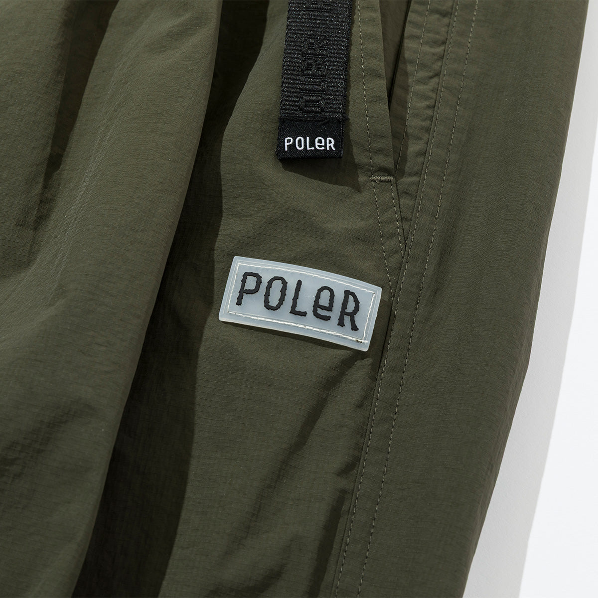 SHIRRING NYLON MULTI POCKET PANTS